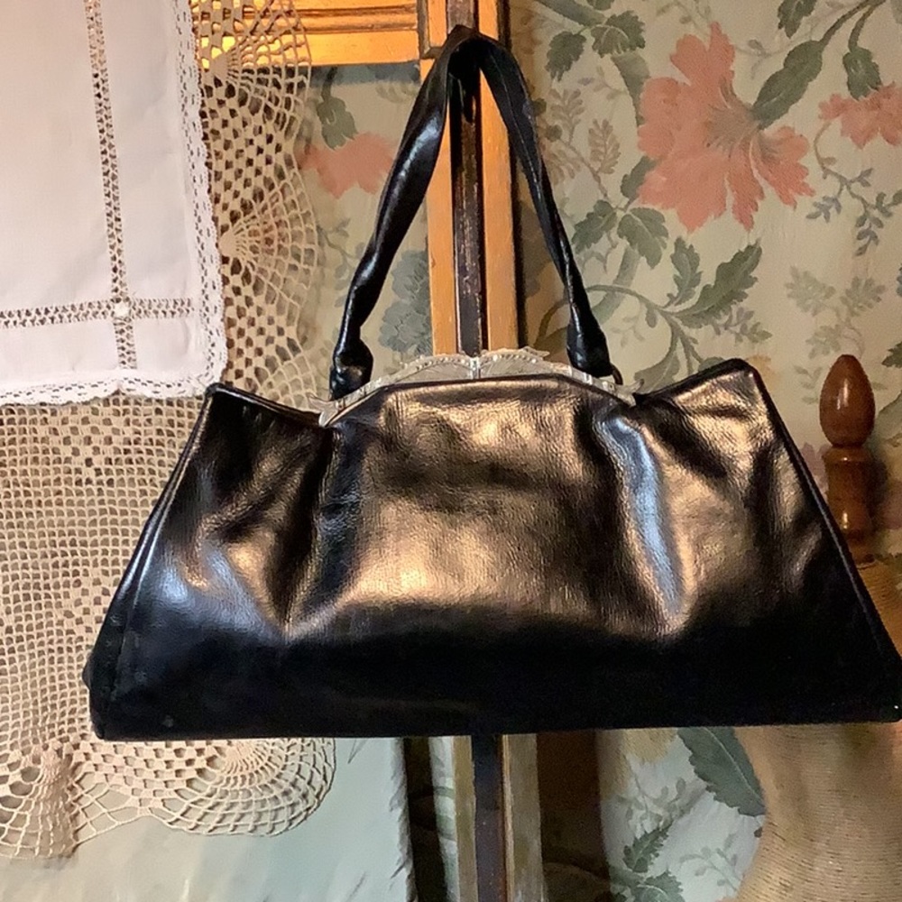Vintage black leather handbag with Marcasite trim and lovely metal clod